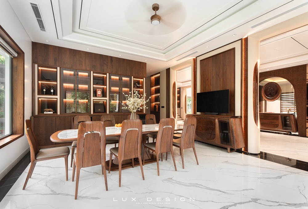 Tổng thể nội thất gỗ óc chó phòng bếp cao cấp được thi công bởi Lux Design